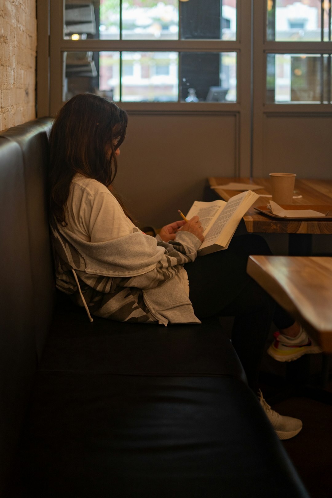 woman reading biography