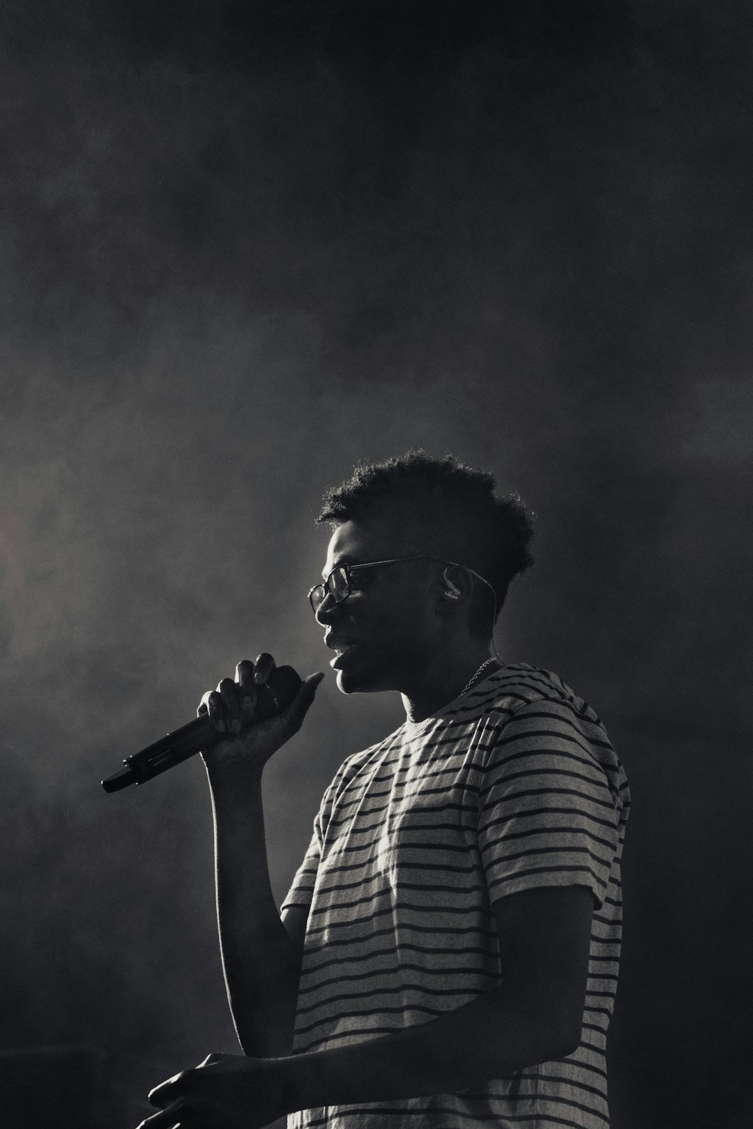 singer performing on stage